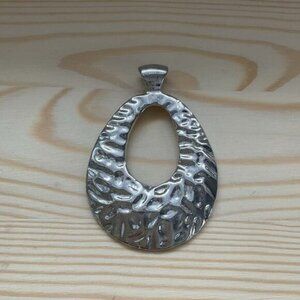 Hammered Silver Tone Oval Pendant With Open Center